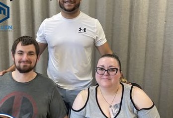Alex Atamian with clients on closing day