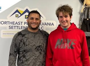 Alex Atamian with clients on closing day